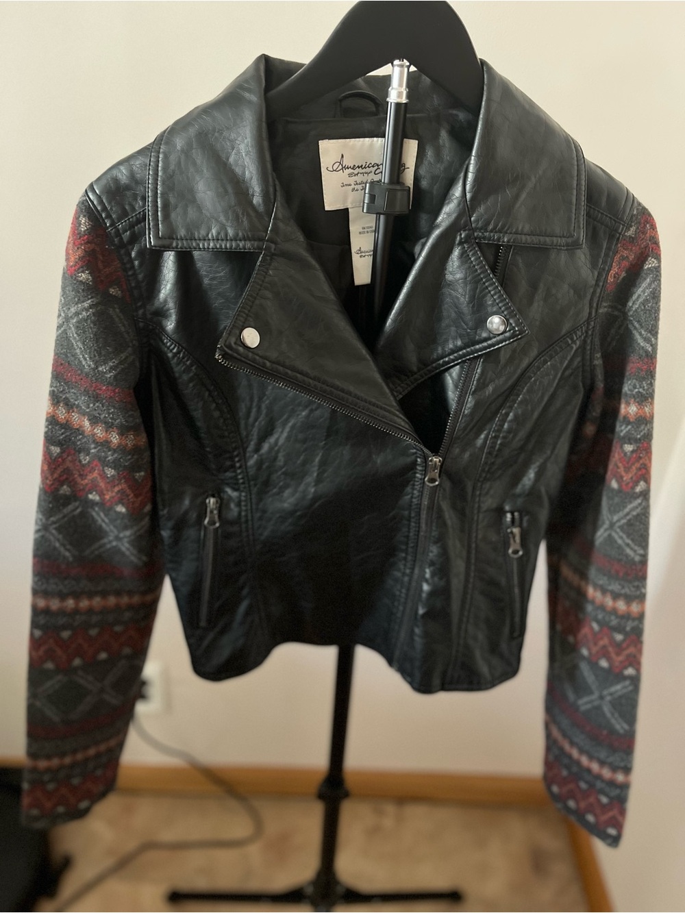 American Rag Black Faux Leather Jacket with Patterned Red and Gray Sleeves